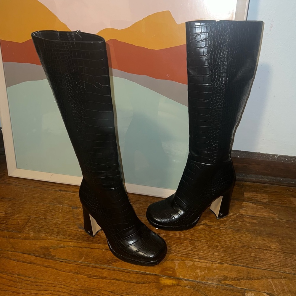 Knee high black boots